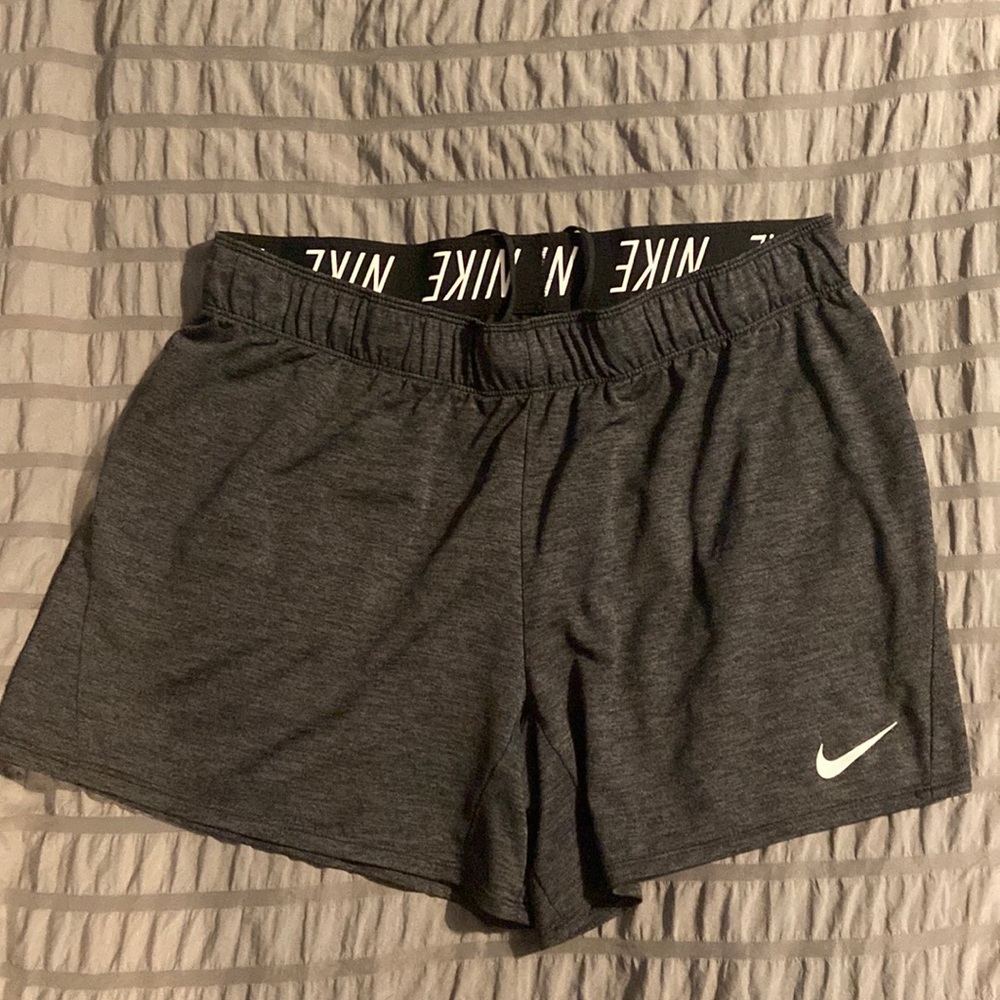 Like new.  Nike running shorts, Dri-fit.